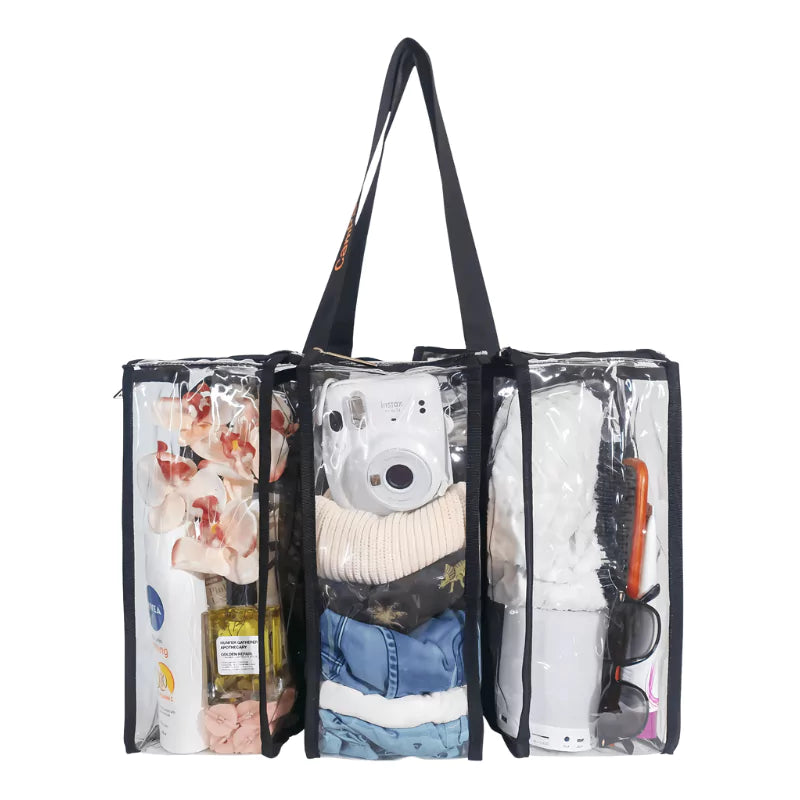 Clear medium black camping bag with compartments containing clothing, camera, toiletries, sunglasses and various items