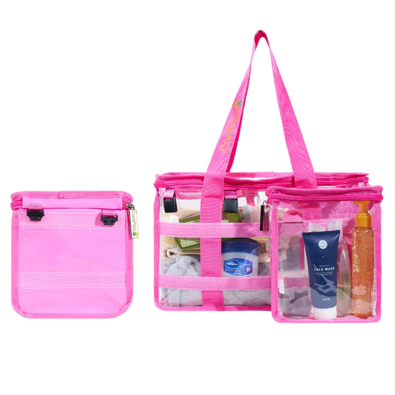 Hot pink clear toiletry bag showing long handles and opaque pocket completely detached with toiletry items in clear pockets