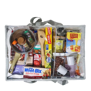 Grey under bed storage bag top view packed with pantry items and utensils
