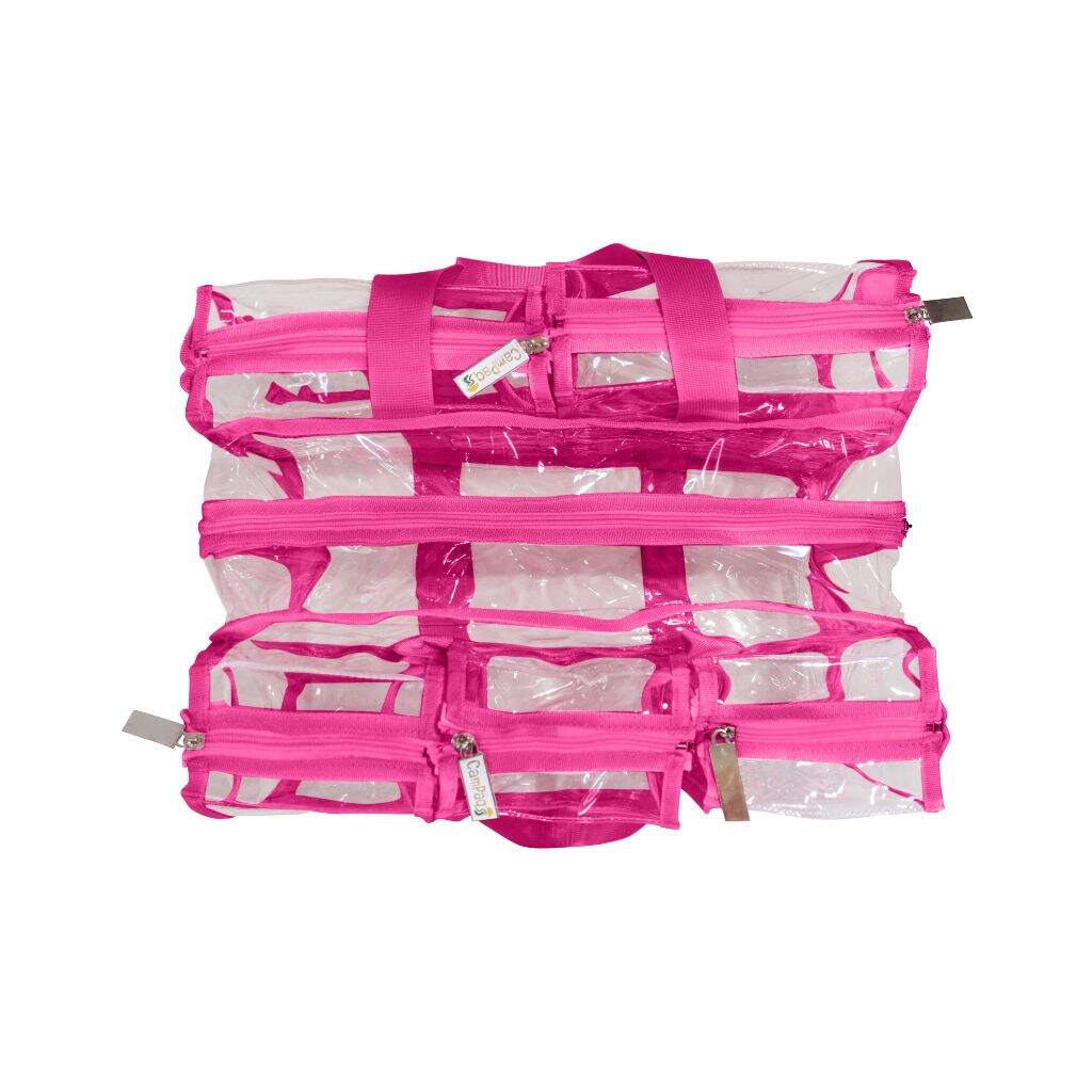 Top view of empty clear hot pink CamPaq Bag showing zips and zip tags