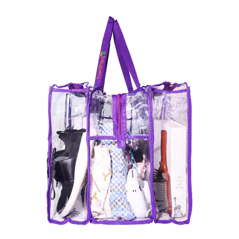 Large clear camping bag with purple handles and trim, containing shoes and clothes