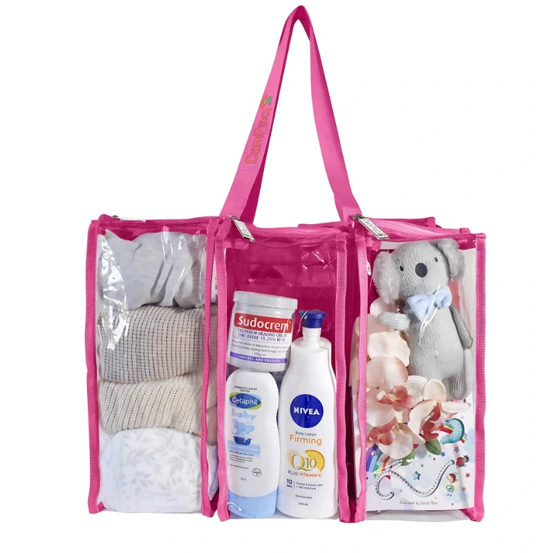 Hot pink medium camping bag filled with baby wear, teddy bears and baby toiletry items