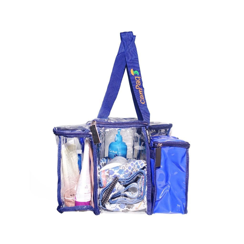 End view of navy CamPaq clear toiletry bag with toiletries inside, privacy pocket visible, and top handles